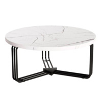 Настоящее фото товара Журнальный столик Stone, белый мрамор, черный, произведённого компанией ChiedoCover